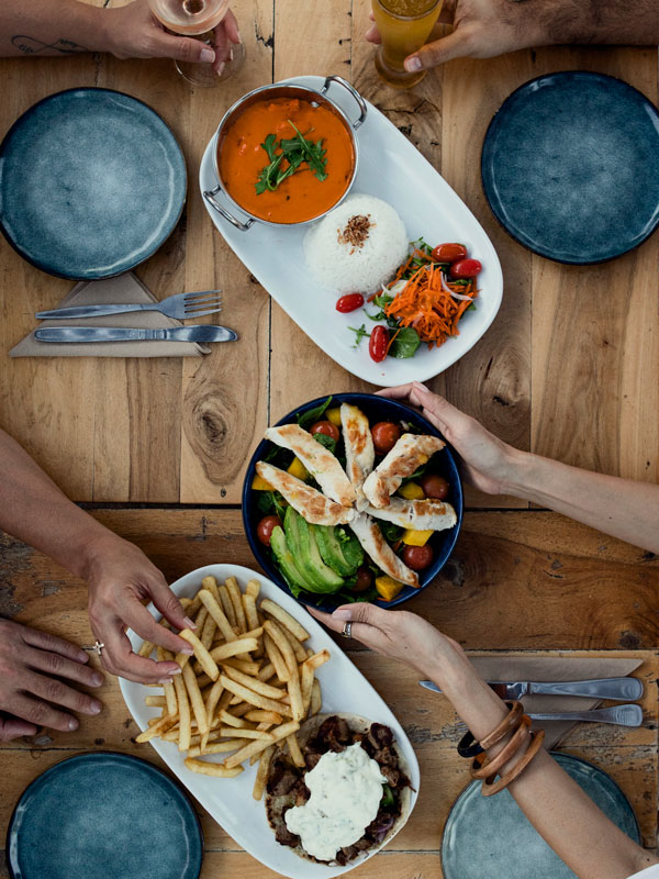 a spread of food at Green Mango Cafe, Broome