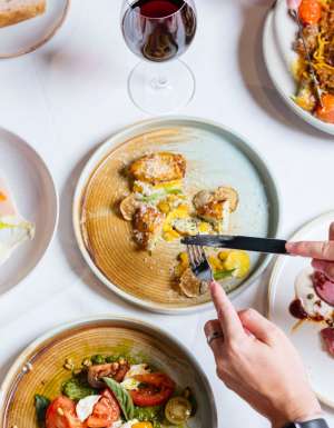 a spread of food on the table at Cichetti Club, Broome