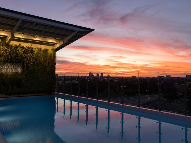 William Inglis Hotel rooftop pool at sunset