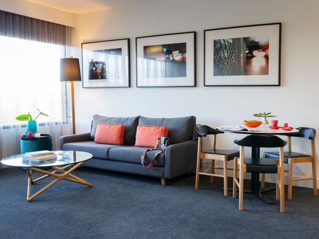 an open-plan living room at East Hotel Canberra