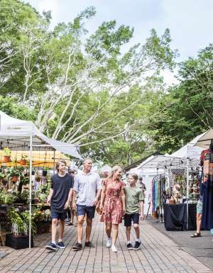 a family visiting Eumundi Markets