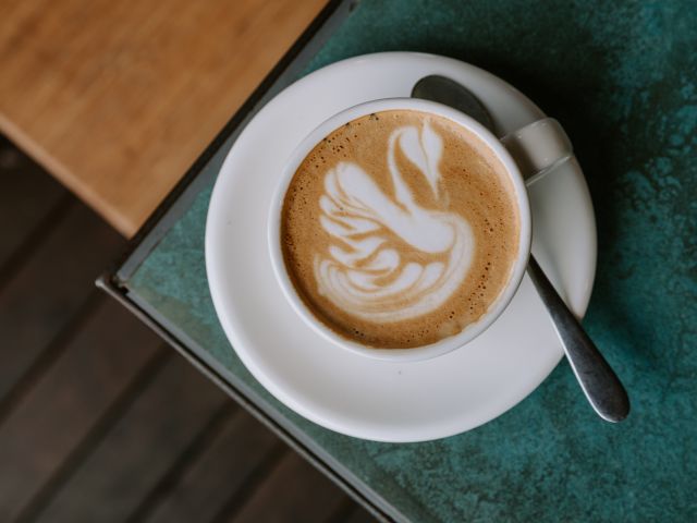 a cup of latte at ONA Coffee House