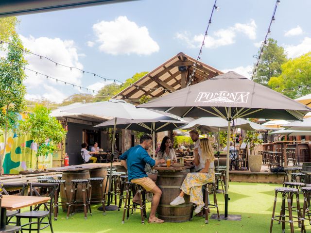 friends bonding over drinks at Pomona Distilling Co.