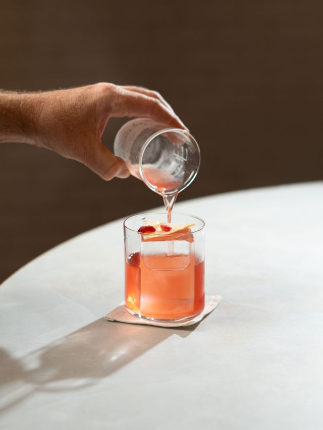 mixing a cocktail drink at Seabourne Distillery, Noosa