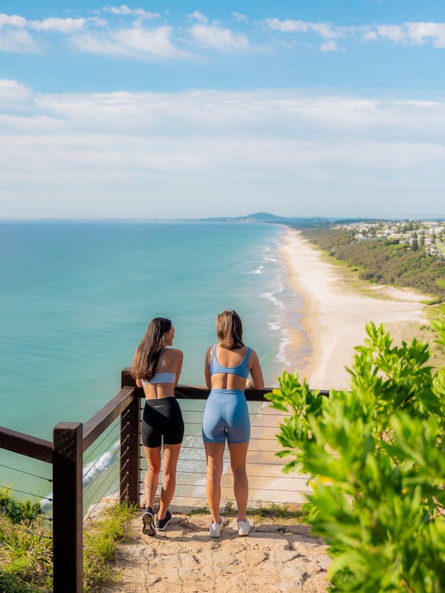 two women admiring ocean views at Sunshine Beach, Noosa