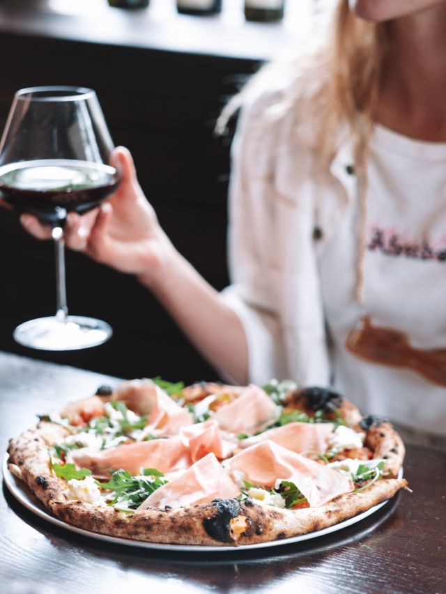 enjoying pizza and wine at Somedays Pizza, Noosa