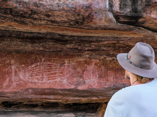 admiring rock art at Ubirr