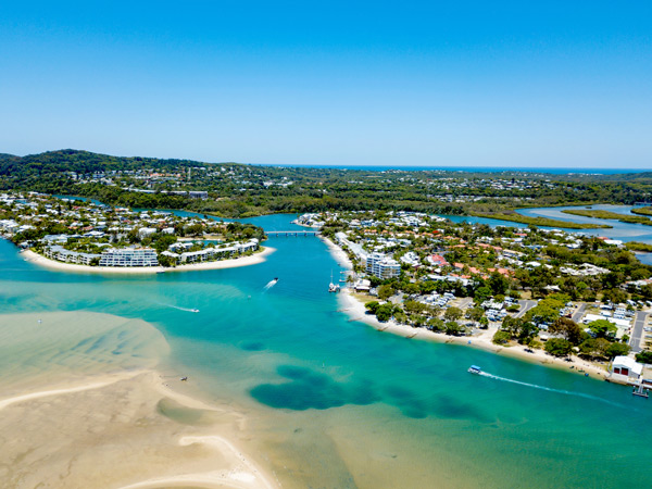 the idyllic waters of Noosa Spit from above