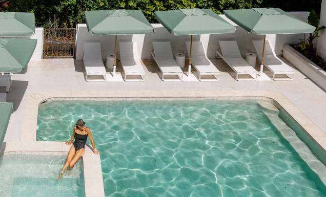 Woman in the pool at The Tamborine Hotel in the Gold Coast Hinterland