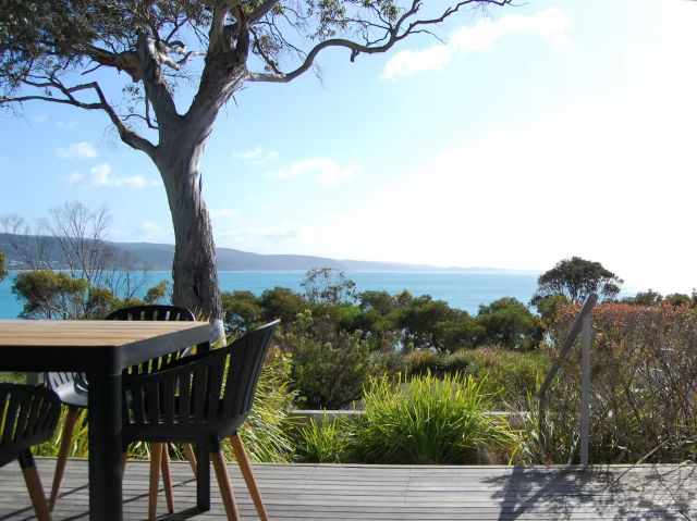 an outdoor dining space at Front Row Apartment in Lorne