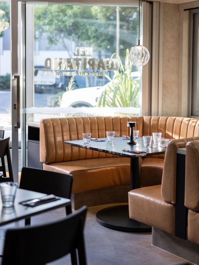 dining table and chairs inside El Capitano Pizzeria & Bar, Noosa