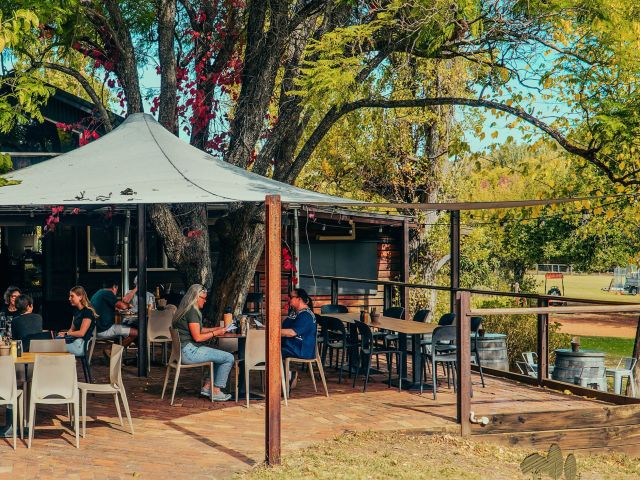 people drinking and dining at the outdoor garden of Lawnbrook Estate, Perth
