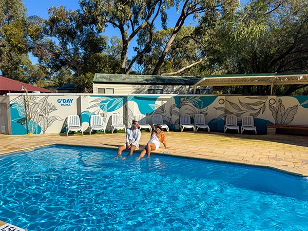 a couple relaxing by the pool at Woodman Point Discovery Park, Perth