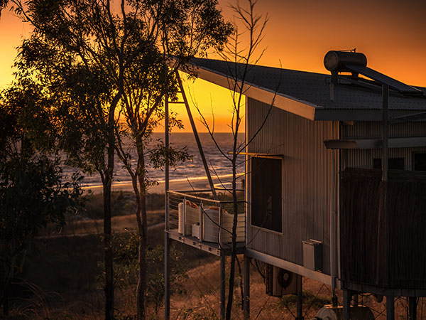 cabin at Berkerly River Lodge during sunset