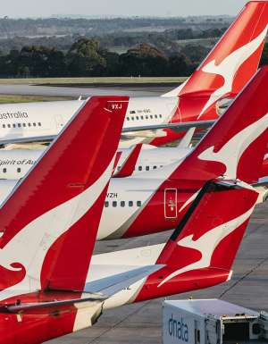 qantas plane tails at airport