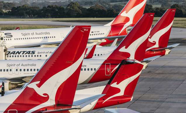 qantas plane tails at airport