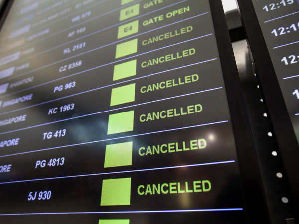 Airport display board showing cancelled flights