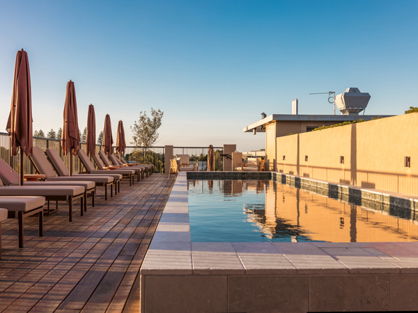 sun loungers by the pool at Hotel Marvell