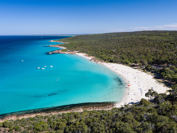 the white sand shore of Meelup Beach from above