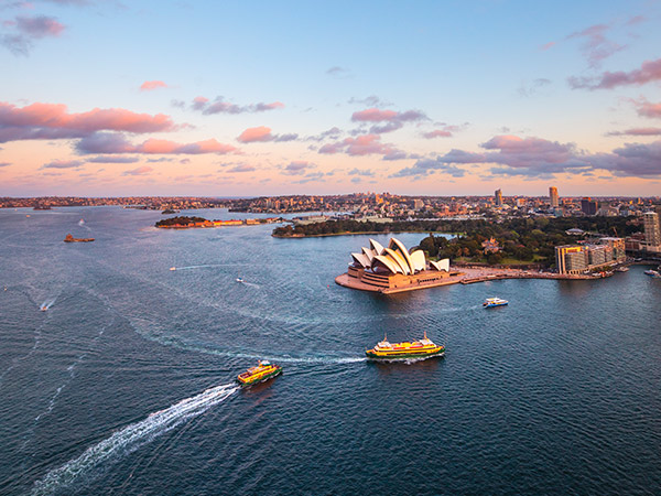 ferries passing the Sydney Opera House