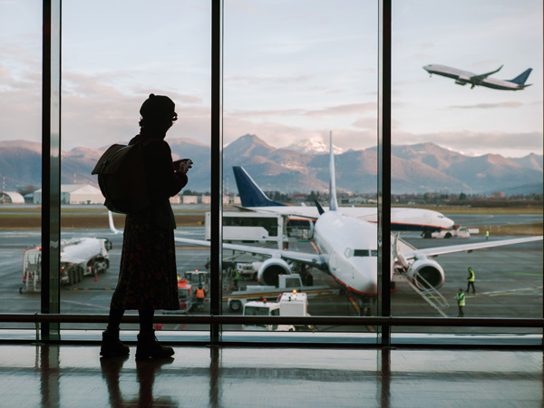 Stock image of traveller at an airport