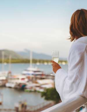 Woman celebrating with a stay at Shangri-La The Marina Cairns