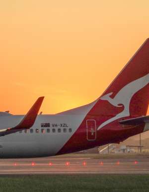 the Qantas plane at sunset