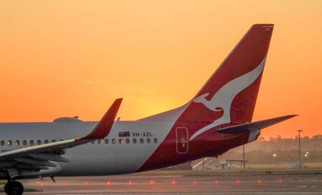 the Qantas plane at sunset