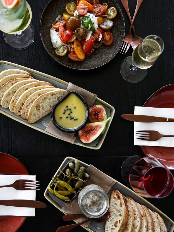 a spread of food on the table at Yoyo Bar, Noosa