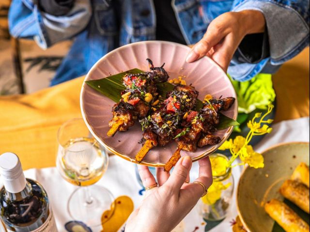 pork neck skewers with grapefruit and peanut at Delta Rue, Sydney