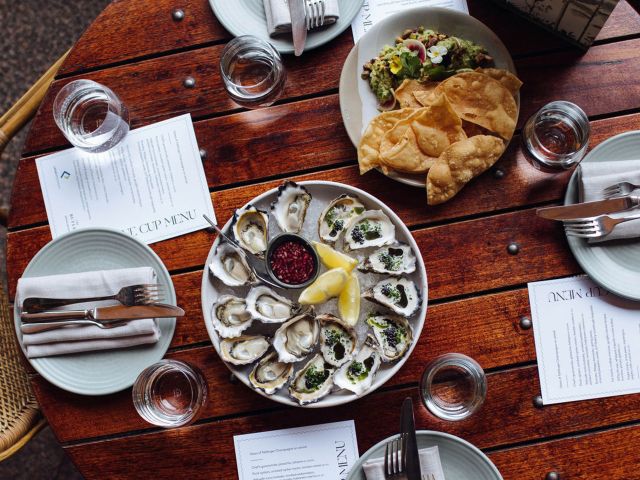a plate of oysters on the table at The Butler, Potts Point
