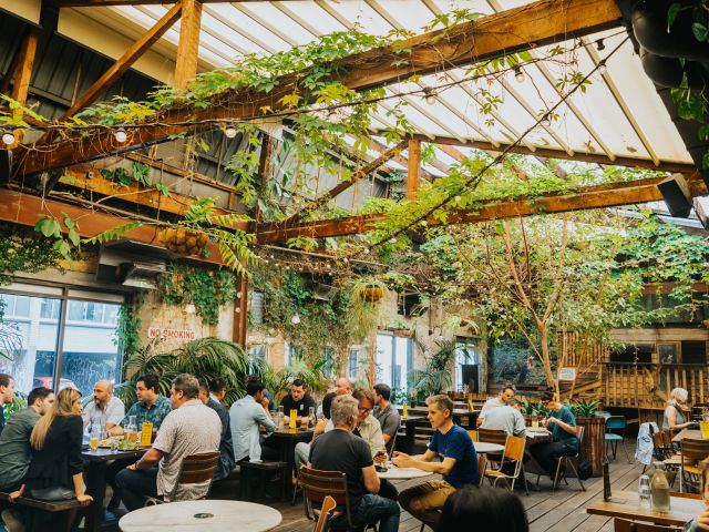 people sitting in the beer garden at Stomping Ground Brewery & Beer Hall, Collingwood