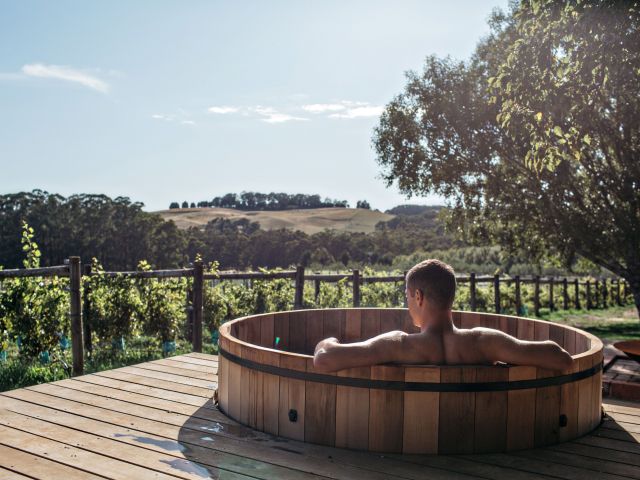 a cedar hot tub at Dairy Flat Lodge & Farm