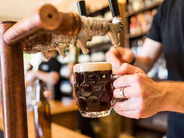 filling up a glass with tap beer at Loch Brewery & Distillery, Melbourne