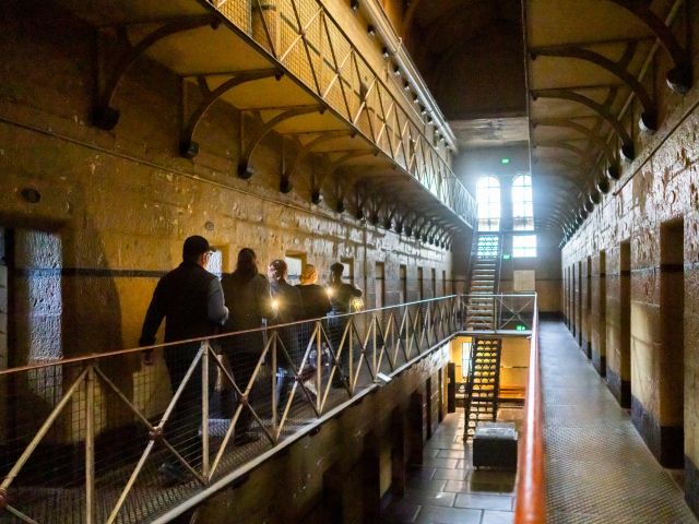 people touring around the Old Melbourne Gaol