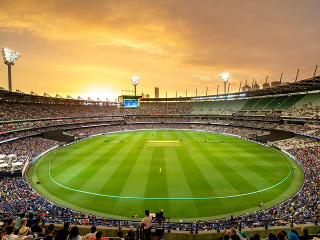 crowds of people watching a game at the Melbourne Cricket Ground