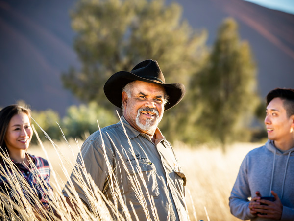 Anangu Elder Sammy Wilson guiding a cultural tour with SEIT Outback