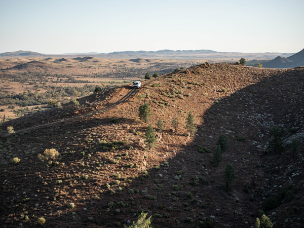 a car driving across Arkaba station in SA
