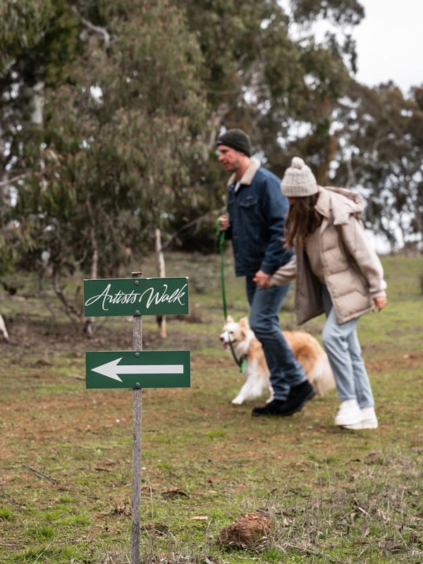 Couple taking the Artists Walk on the Heysen property in Adelaide Hills