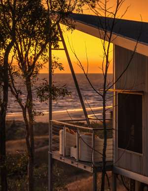 cabin at Berkerly River Lodge during sunset