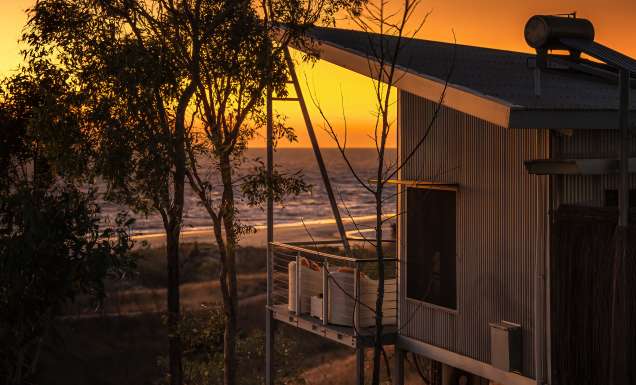 cabin at Berkerly River Lodge during sunset