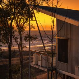 cabin at Berkerly River Lodge during sunset