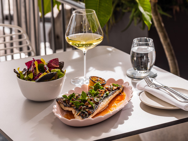 food and drinks on the table at PIER DINING