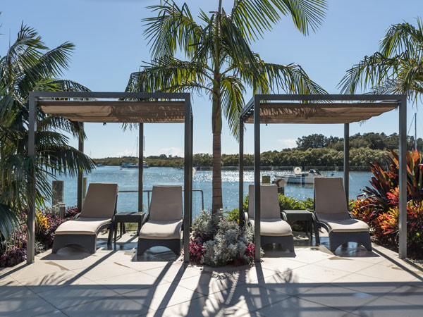 the shaded sun loungers at Sails Port Macquarie by Rydges