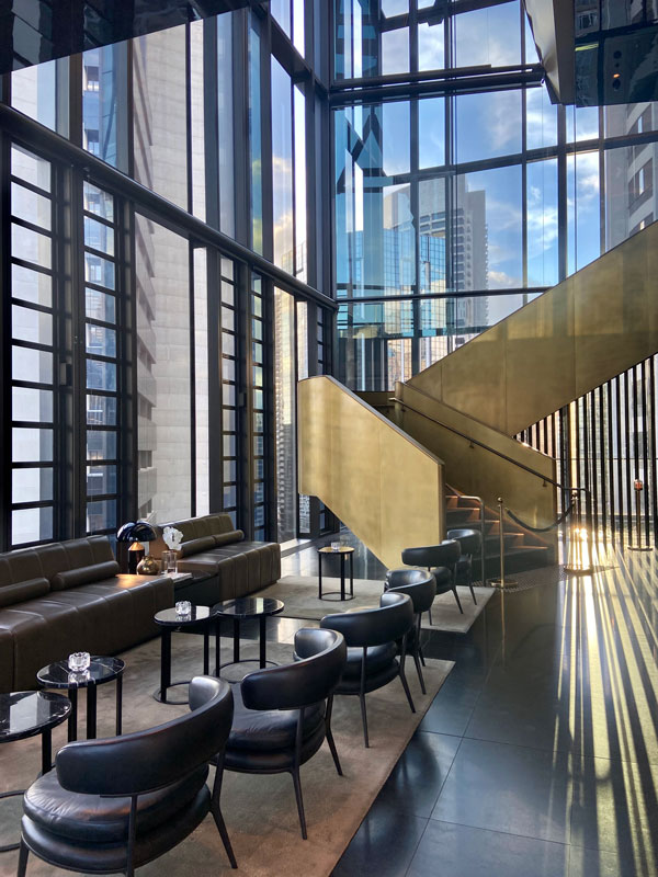 the interior of A by Adina Sydney with floor-to-ceiling windows