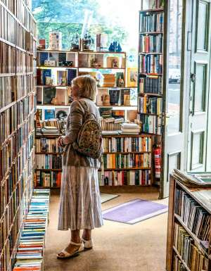 Lady browsing bookshop