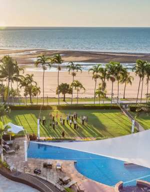 an aerial view of the beach and pool at Mindil Beach Casino Resort Darwin