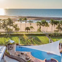 an aerial view of the beach and pool at Mindil Beach Casino Resort Darwin