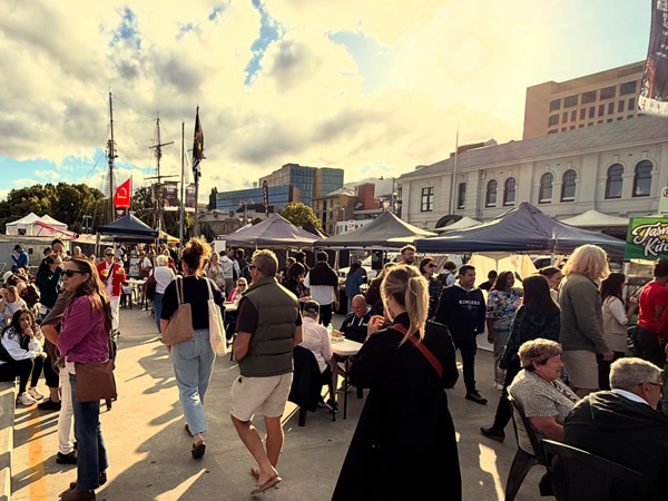 people perusing the stalls at Hobart Twilight Market