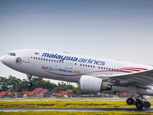 Malaysian Airlines A330-200 rolling out at runway 25R, Soekarno Hatta International Airport